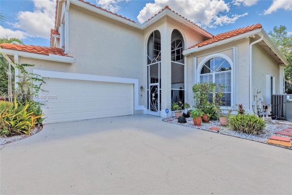 Pelican Cay, 10974 N Danbury Way, Boca Raton, Florida 33498, image 1