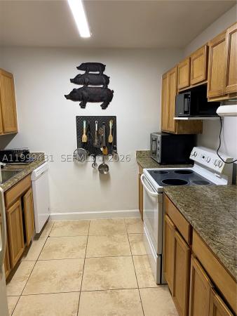 Sutton House, 1855 NE 121st St #36, North Miami, Florida 33181, image 2