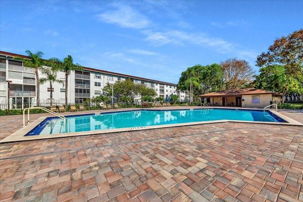 Cambridge At Century Village, 1200 SW 124th Ter #106O, Pembroke Pines, Florida 33027, image 1