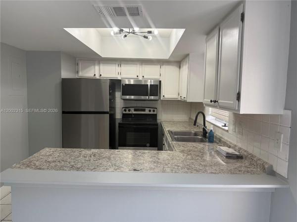 Tam O'Shanter Gardens, 7926 Kimberly Blvd #202, North Lauderdale, Florida 33068, image 1