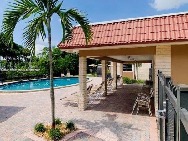 Manor Grove Village, 124 NE 19th Ct #114B, Wilton Manors, Florida 33305, image 1