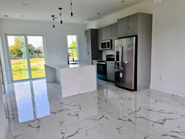 402 Harrison Dr, Lehigh Acres, Florida 33936, image 2