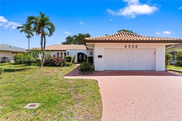 The Woodlands, 4508 King Palm Dr, Tamarac, Florida 33319, image 1