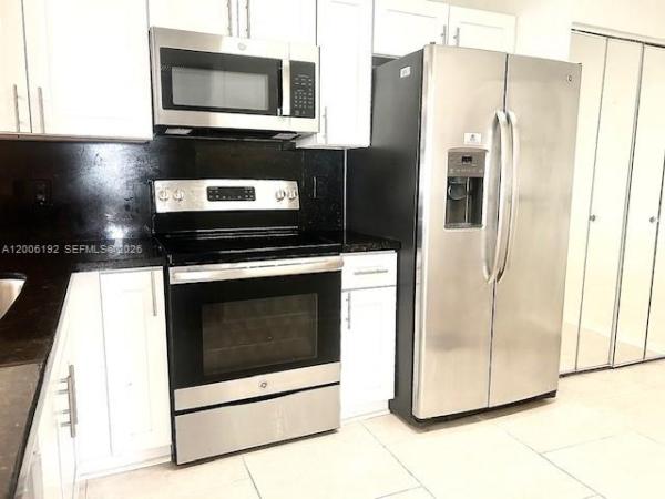 871 NE 207th Ter #4-101, Unincorporated Dade County, Florida 33179, image 1
