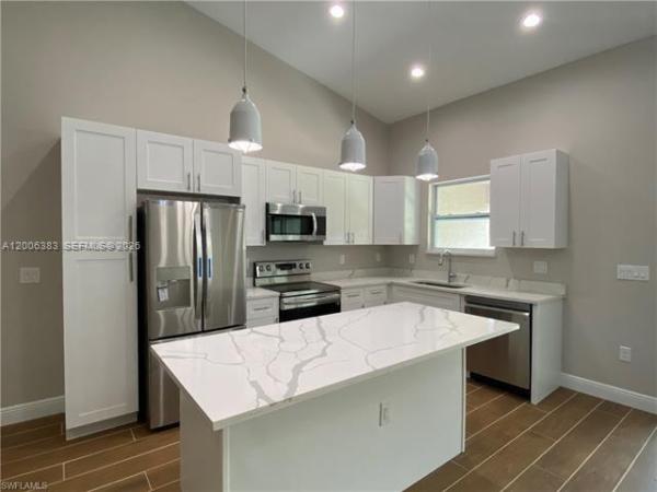 117-119 Mdw, Lehigh Acres, Florida 33973, image 1