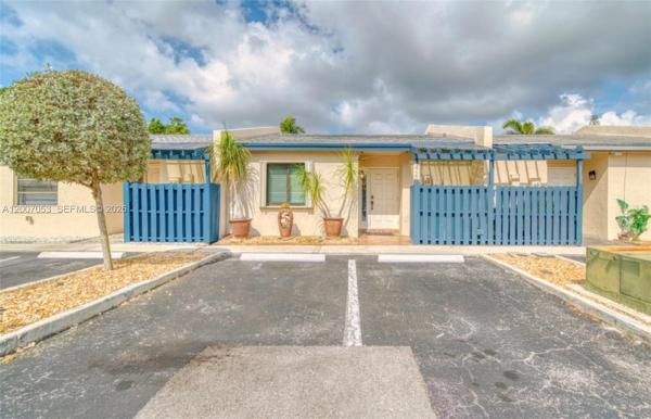 Rainbow Lakes Villas, 1720 NW 92nd Ave, Pembroke Pines, Florida 33024, image 1