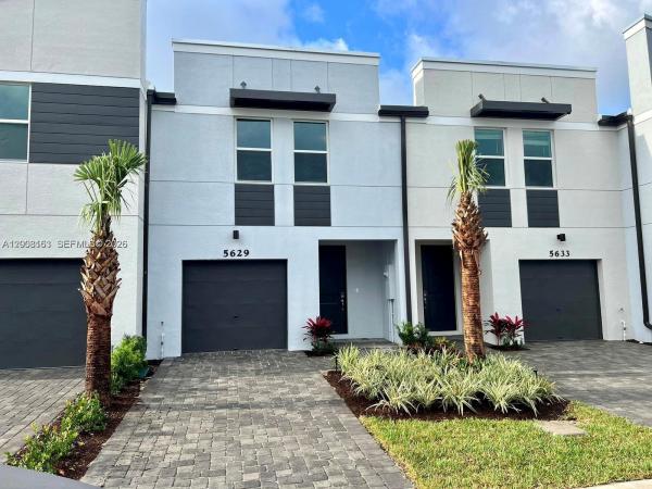 Enclave At Mangonia Park, 5629 Mentmore Dr, Mangonia Park, Florida 33407, image 1