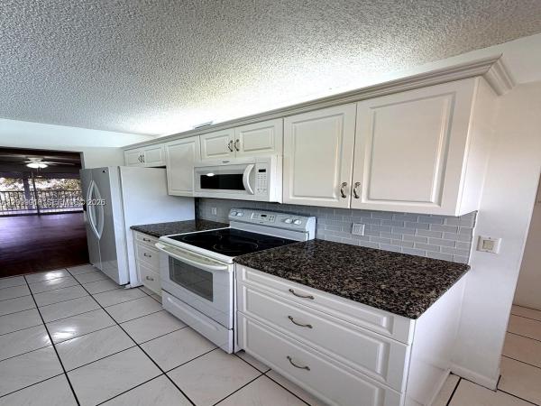 Cambridge At Century Village, 1400 SW 124th Ter #402Q, Pembroke Pines, Florida 33027, image 2