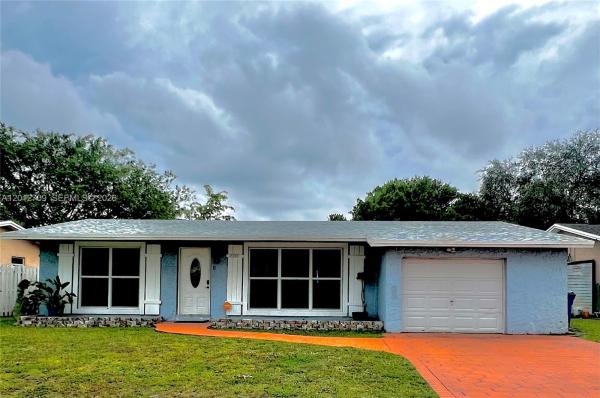 Sunrise Golf Village, 8350 NW 27th Pl, Sunrise, Florida 33322, image 1