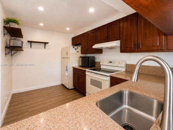 Miramar Club, 3199 Foxcroft Rd #215, Miramar, Florida 33025, image 1