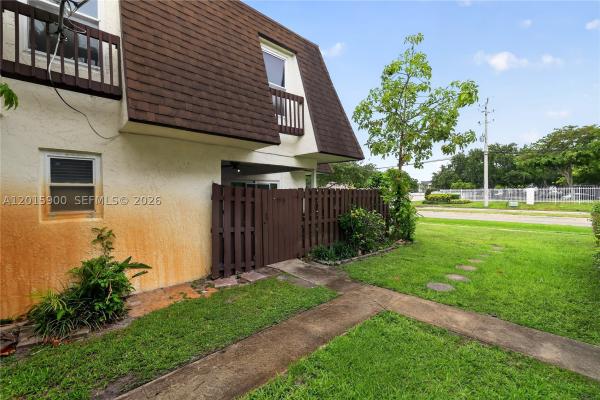 Willow Wood Townhomes, 7913 Tam Oshanter Blvd, North Lauderdale, Florida 33068, image 1