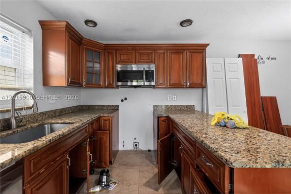Willow Wood Townhomes, 7913 Tam Oshanter Blvd, North Lauderdale, Florida 33068, image 3