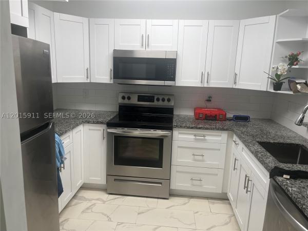 Sunrise Towne, 5952 NW 25th Pl #234, Sunrise, Florida 33313, image 1