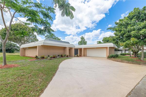 The Woodlands, 5201 Yellow Pine Ln, Tamarac, Florida 33319, image 1