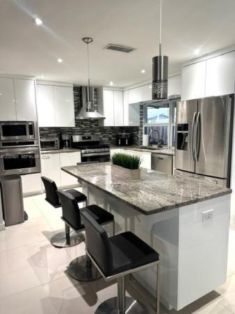 Sunrise Golf Village, 9551 NW 19th Pl, Sunrise, Florida 33322, image 1
