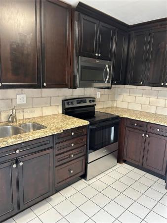 1136 NE 210th Ter, Unincorporated Dade County, Florida 33179, image 1