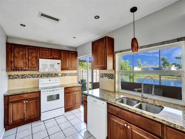Sunrise Golf Village, 8550 NW 27th Pl, Sunrise, Florida 33322, image 2