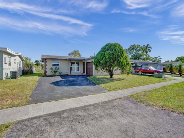 Sunrise Golf Village, 8550 NW 27th Pl, Sunrise, Florida 33322, image 1