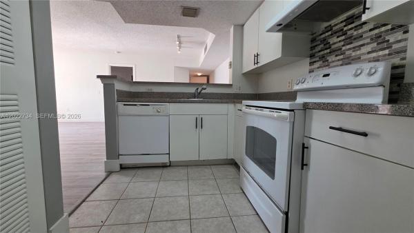 5011 Wiles Rd #203, Coconut Creek, Florida 33073, image 1