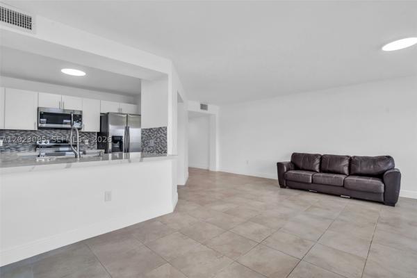 Suffolk At Century Village, 13705 SW 12th St #102B, Pembroke Pines, Florida 33027, image 1
