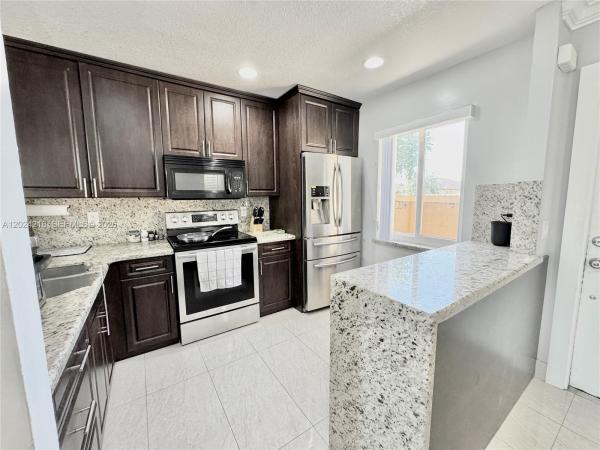 Sunrise Manor North, 10991 NW 30th Pl, Sunrise, Florida 33322, image 1