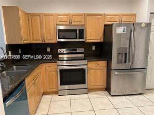 Courtyard At The Grove, 3907 Tree Top Dr, Weston, Florida 33332, image 2