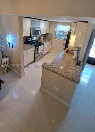 Le Cartier, 201 178th Dr #209, Sunny Isles Beach, Florida 33160, image 1