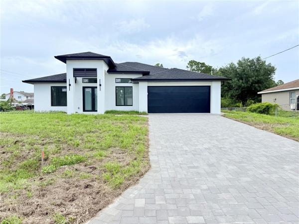 705 Colyer St E, Lehigh Acres, Florida 33974, image 1