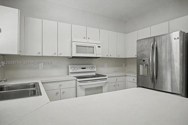 Caribbean Isles Villas, 373 NE 26th Pl #102, Homestead, Florida 33033, image 1
