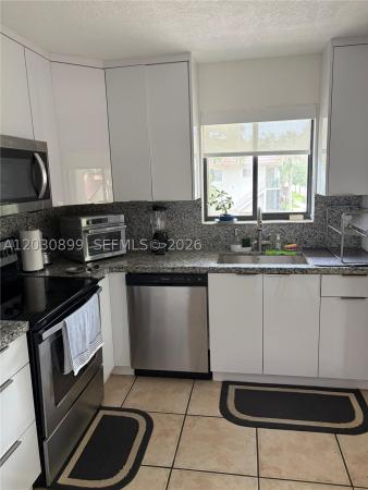 Saddle Club Garden, 16184 Laurel Dr #204, Weston, Florida 33326, image 1