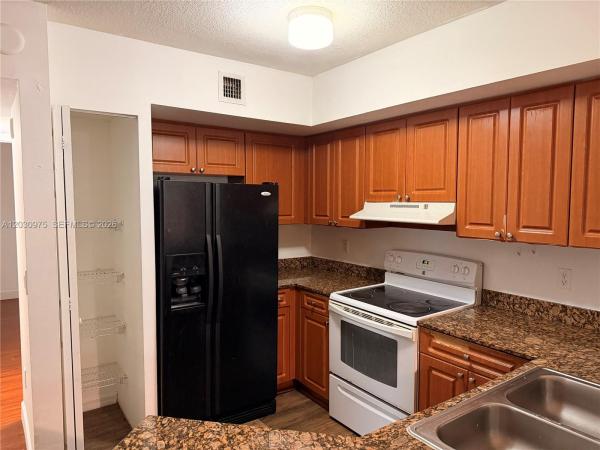 The Oaks At Miami Gardens, 17602 NW 25th Ave #303, Miami Gardens, Florida 33056, image 1