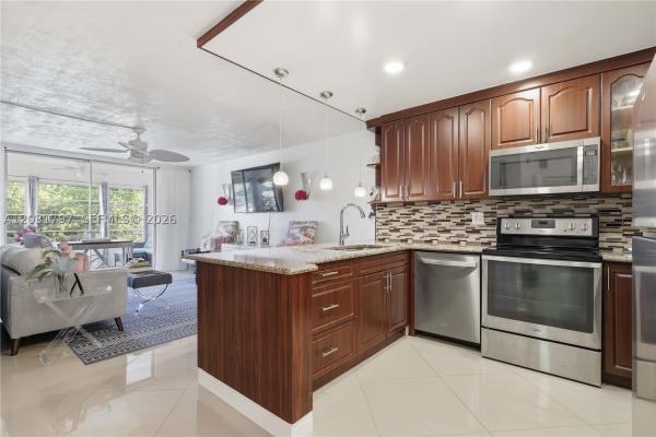 Omega, 7100 NW 17th St #210, Plantation, Florida 33313, image 3