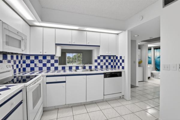 Cambridge At Century Village, 1200 SW 125th Ave #410L, Pembroke Pines, Florida 33027, image 1