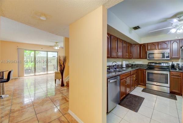 Sunplace Villas At Springtree, 7661 NW 38th Ct, Sunrise, Florida 33351, image 3