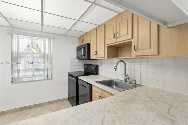 Oriole Golf & Tennis Club 1, 7887 Golf Circle Dr #203, Margate, Florida 33063, image 1