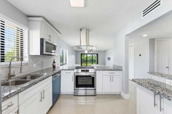 The Gardens Of Bonaventure 14 East, 16451 Blatt Blvd #201, Weston, Florida 33326, image 1