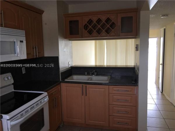 315 NW 109th Ave #207, Unincorporated Dade County, Florida 33172, image 1