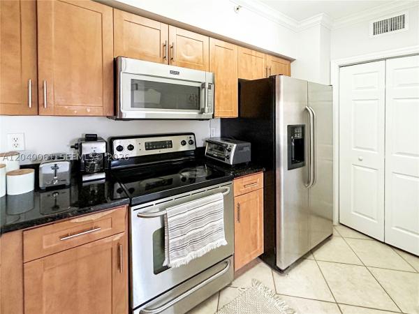 6458 Emerald Dunes Dr #303, West Palm Beach, Florida 33411, image 2