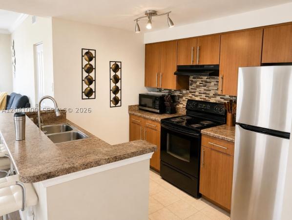 Poinciana Place, 5980 W Sample Rd #307, Coral Springs, Florida 33067, image 2