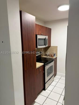 Poinciana At Miami, 600 NW 32nd Pl #303, Miami, Florida 33125, image 1