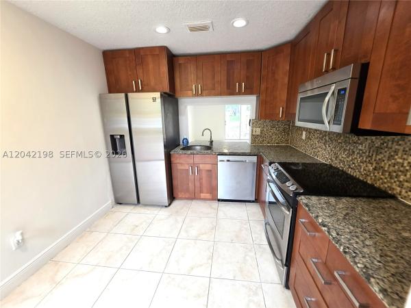 14237 SW 94th Cir Ln #103, Unincorporated Dade County, Florida 33186, image 1