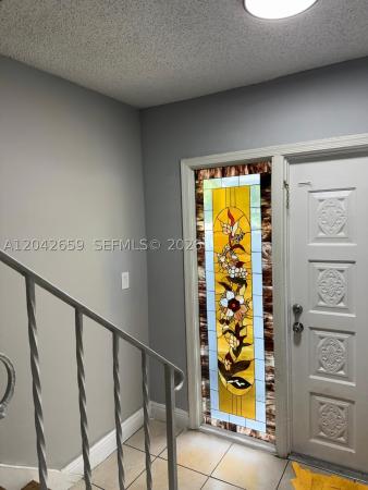 Tam O'Shanter Villas, 6595 Boulevard Of Champions, North Lauderdale, Florida 33068, image 2