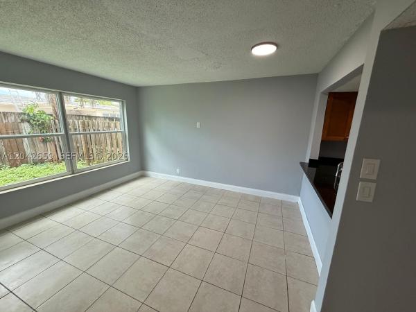 Tam O'Shanter Villas, 6595 Boulevard Of Champions #6595, North Lauderdale, Florida 33068, image 1