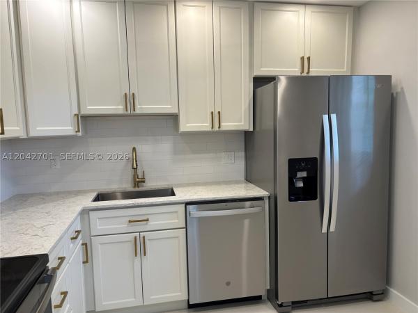 Cambridge House Of Carriage Hills, 300 Berkley Rd #103, Hollywood, Florida 33024, image 2