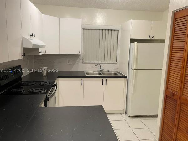 Silver Gardens Villas, 10101 W Okeechobee Rd #5202, Hialeah Gardens, Florida 33016, image 1