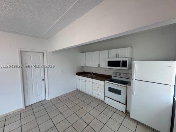 Comfort Gardens, 1236 NW 33rd Ave #1, Miami, Florida 33125, image 3