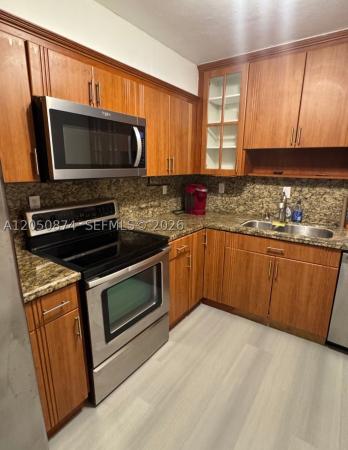 Omega, 7300 NW 17th St #408, Plantation, Florida 33313, image 2