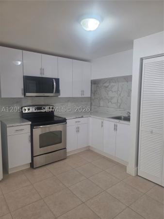 1921 NW 59th St #D, Unincorporated Dade County, Florida 33142, image 2
