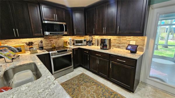 Jasmine At Woodmont, 7252 Woodmont Ave, Tamarac, Florida 33321, image 2