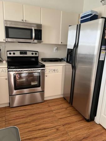 Shoma Homes At Country Club, 17820 NW 73rd Ave #200-1, Hialeah, Florida 33015, image 1